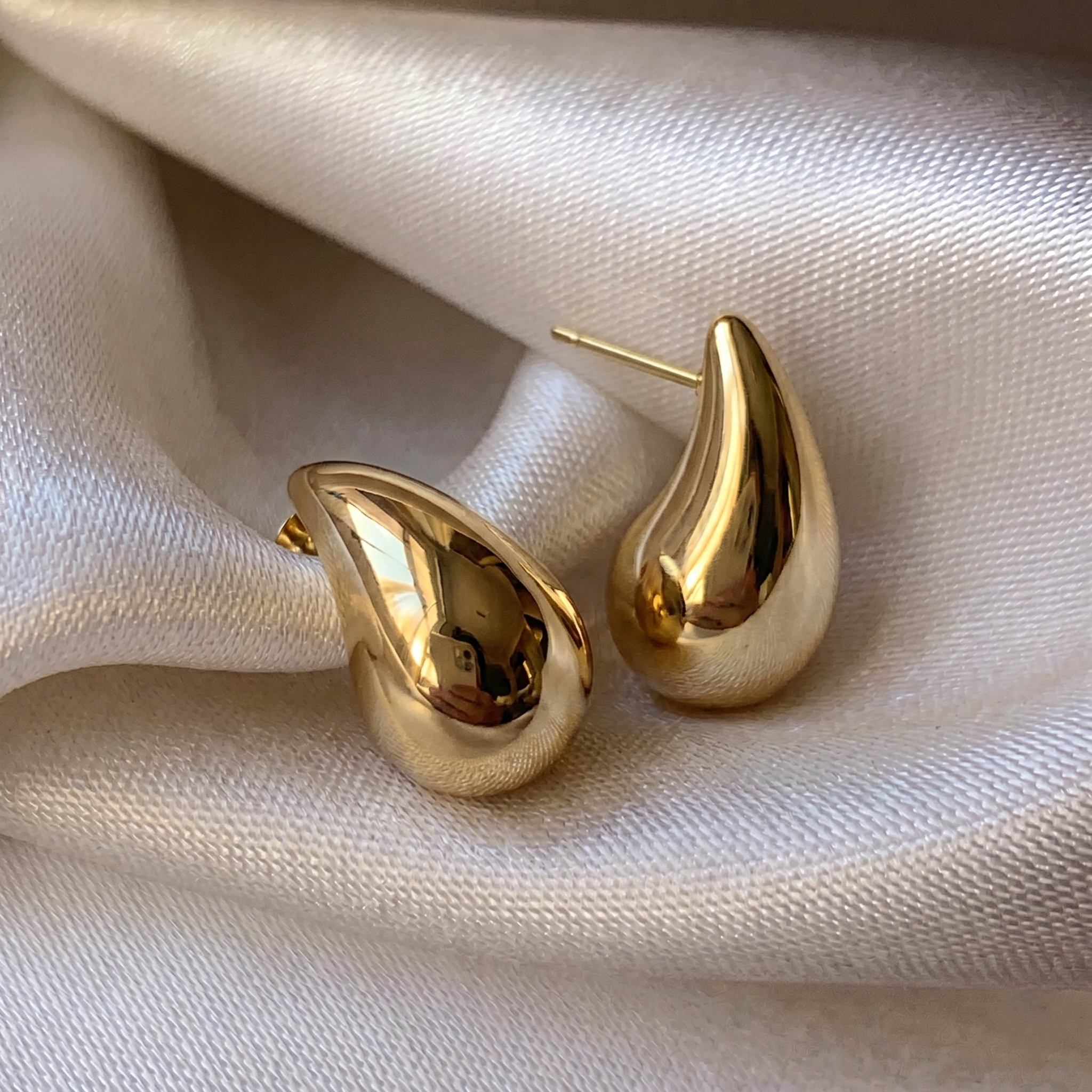 Elegant Polished Gold Teardrop Stud Earrings